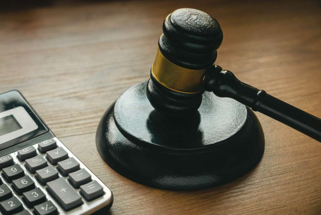 Law and finance. Bankcruptcy, tax law, bribe, corruption, arbitration, penalty concept.